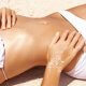 woman on the beach brazilian sugaring wax